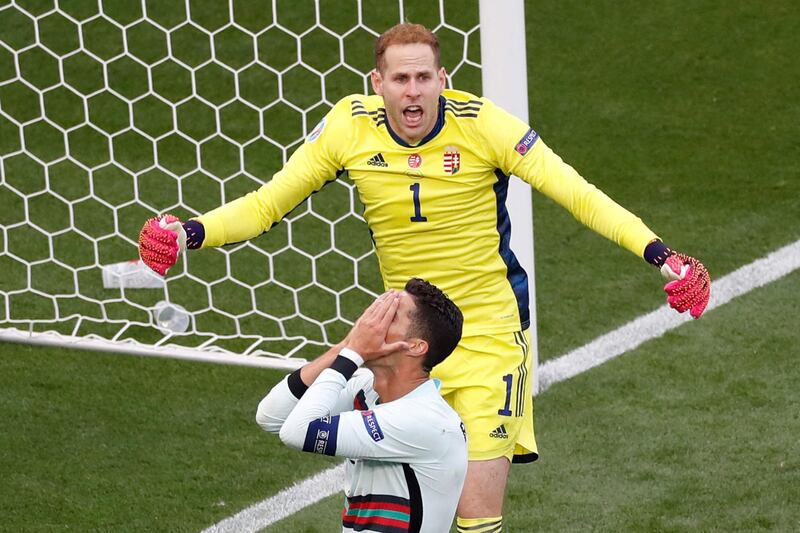 Hungary goalkeeper Peter Gulacsi reacts after Cristiano Ronaldo missed a chance to open the scoring. AFP