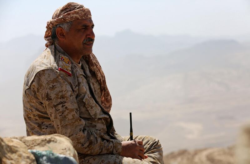 Yemeni commander Nasr al-Dibani from the Popular Resistance Committees, loyal to the Saudi-backed Yemeni president, looks on as they hold a position during clashes with Shiite Huthi rebels and their allies in the Nihm district, on the eastern edges of the capital Sanaa, on January 30, 2018.
Backed by air support from the Saudi-led coalition, the Yemeni army in recent months has toppled multiple Huthi rebel bases on Nihm, a rugged chain of cloud-cutting mountains on the eastern edge of Sanaa, which has been held by the insurgents since September 2014. / AFP PHOTO / ABDULLAH AL-QADRY