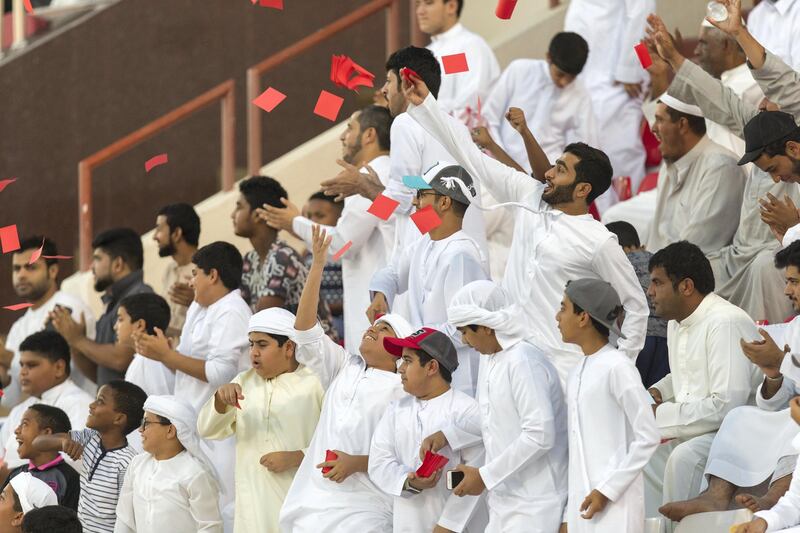 Fujairah, United Arab Emirates, November 4, 2017:    Supporters of Fujairah football club celebrate scoring against Al Orouda during their UAE first division regular season match at the Fujairah stadium in Fujairah on November 4, 2017. Christopher Pike / The National

Reporter: John McAuley
Section: Sport