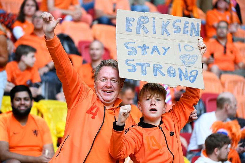 Netherlands fans display a sign in support for Denmark's Christian Eriksen before the Euro 2020 Group C match against Ukraine at Johan Cruyff Arena, Amsterdam. Reuters