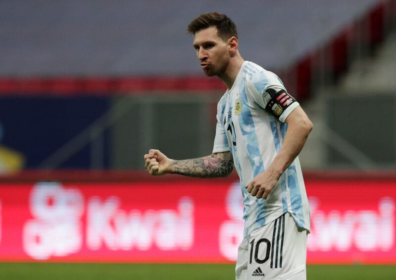 Lionel Messi celebrates after scoring during the penalty shootout.