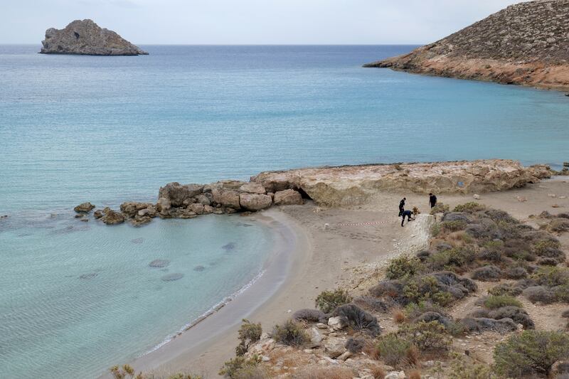 Police cordon off part of a beach due to falling rocks in Xerokampos village after a strong earthquake shook Crete island. EPA