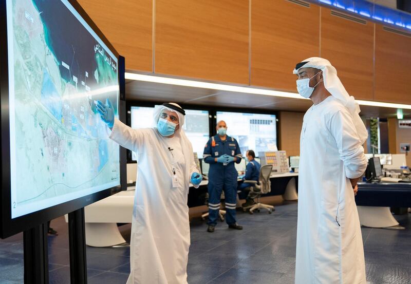 Sheikh Mohamed is given a presentation during a visit to an Adnoc facility in Ruwais.  Courtesy: Sheikh Mohamed bin Zayed Twitter