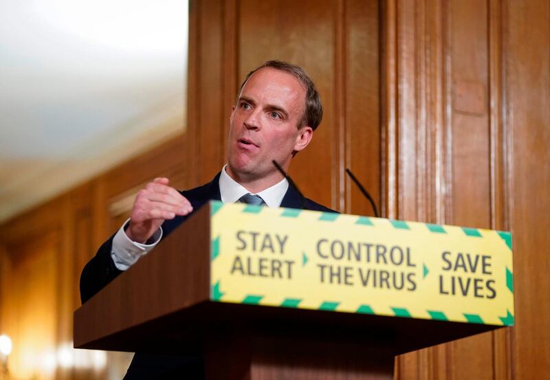 A handout image released by 10 Downing Street, shows Britain's Foreign Secretary Dominic Raab attending a remote press conference to update the nation on the COVID-19 pandemic, inside 10 Downing Street in central London on June 15, 2020.  - RESTRICTED TO EDITORIAL USE - MANDATORY CREDIT "AFP PHOTO / 10 DOWNING STREET  " - NO MARKETING - NO ADVERTISING CAMPAIGNS - DISTRIBUTED AS A SERVICE TO CLIENTS
 / AFP / 10 Downing Street / Pippa FOWLES / RESTRICTED TO EDITORIAL USE - MANDATORY CREDIT "AFP PHOTO / 10 DOWNING STREET  " - NO MARKETING - NO ADVERTISING CAMPAIGNS - DISTRIBUTED AS A SERVICE TO CLIENTS
