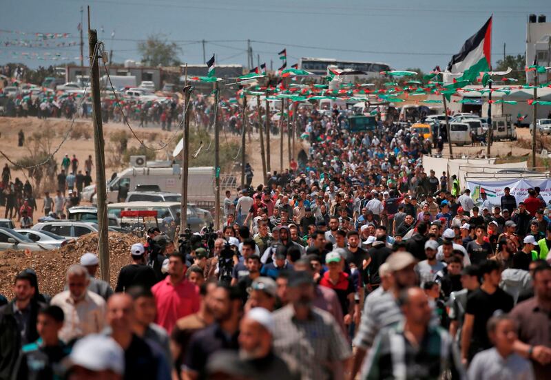 Palestinian demonstrators gather east of Gaza City in the Gaza Strip, during a protest marking 71th anniversary of Nakba -- also known as Day of the Catastrophe in 1948. AFP