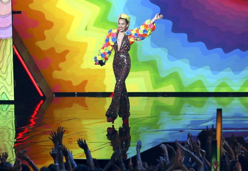 Show host Miley Cyrus takes the stage. Mario Anzuoni / Reuters
