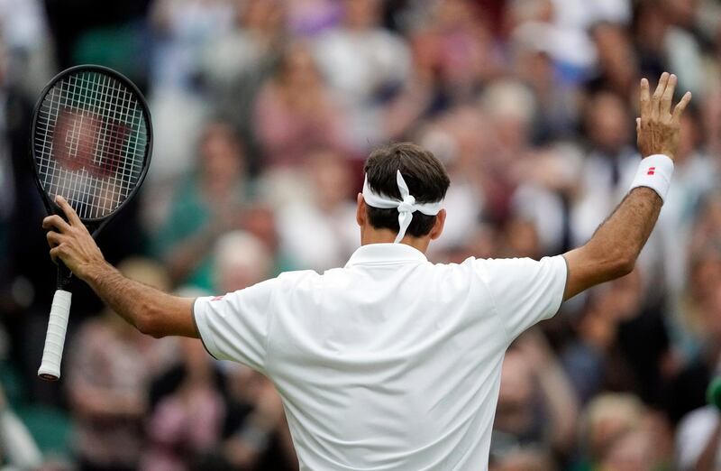 epa07704151 Roger Federer of Switzerland celebrates his win over Matteo Berrettini of Italy in their fourth round match during the Wimbledon Championships at the All England Lawn Tennis Club, in London, Britain, 08 July 2019. EPA/NIC BOTHMA EDITORIAL USE ONLY/NO COMMERCIAL SALES