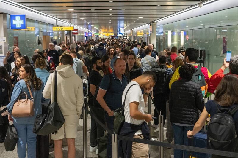 Travellers wait in a long queue to pass through a security check at Heathrow airport in London, England. Overall air travel demand, measured in revenue passenger kilometres, or RPKs, was up 78.7 per cent annually in April. Photo: Getty