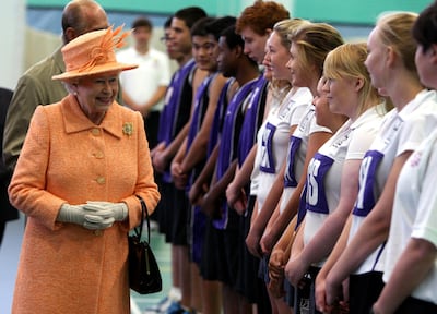 Queen Elizabeth II meets pupils during a visit to Gordonstoun, where she opened a new sports hall on September 14, 2010. Getty Images
