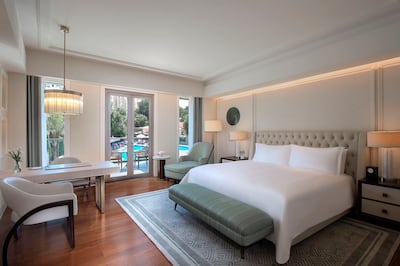 The rooms are decorated with a rich colour palette of greens, blues and neutral tones. Photo: Waldorf Astoria Cairo Heliopolis