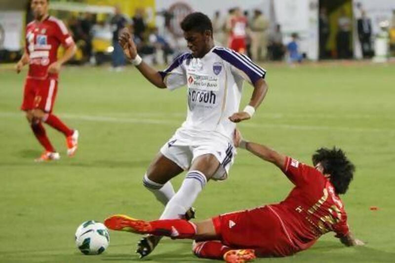 Al Ain, in white, contested this season's Super Cup against Al Jazira on September 17 last year in Dubai. Mike Young / The National