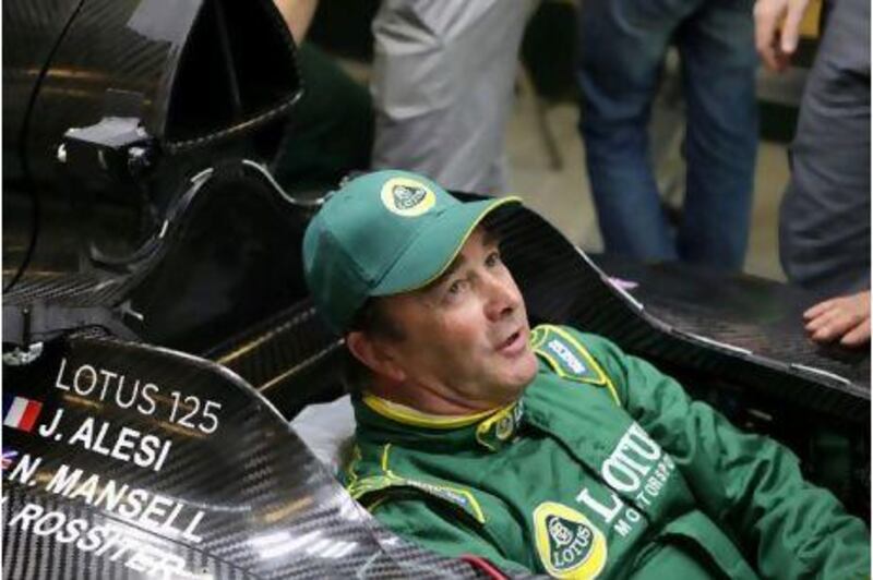 Nigel Mansell tries out the Lotus Type 125 on Wednesday at Yas Marina Circuit.