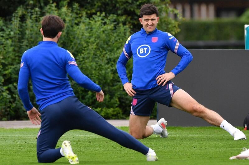 England defender Harry Maguire stretches during training. AFP