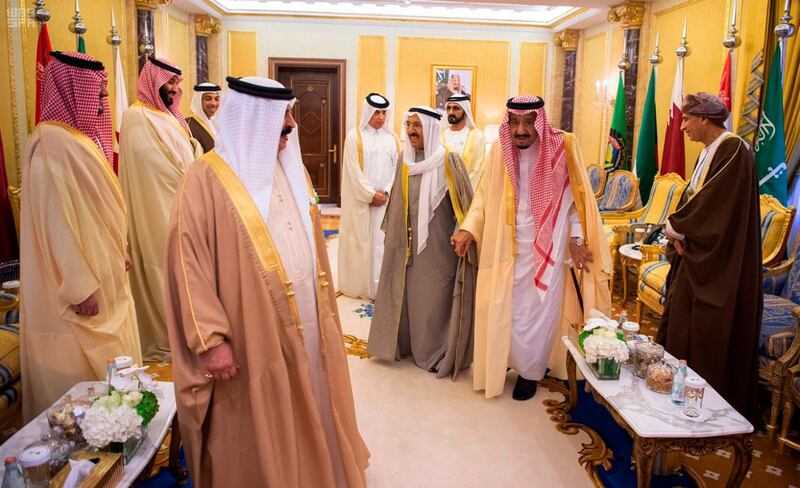 In this photo released by the state-run Saudi Press Agency, Saudi King Salman, second from right, holds hands with Kuwait's ruling emir Sheikh Sabah Al Ahmad Al Sabah, during a sidelines meeting of the Gulf Cooperation Council meet in Riyadh, Saudi Arabia, Sunday, Dec. 9, 2018. Leaders of Gulf Arab countries, including those boycotting Qatar, met on Sunday in Saudi Arabia's capital for a regional summit, a gathering that Qatar's ruling emir choose not to attend amid the dispute. (Saudi Press Agency via AP)