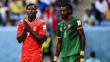 Switzerland's Breel Embolo and Cameroon's Andre-Frank Zambo Anguissa during the FIFA World Cup 2022 group G soccer match between Switzerland and Cameroon at Al Janoub Stadium in Al Wakrah, Qatar, 24 November 2022.   EPA / LAURENT GILLIERON SWITZERLAND OUT