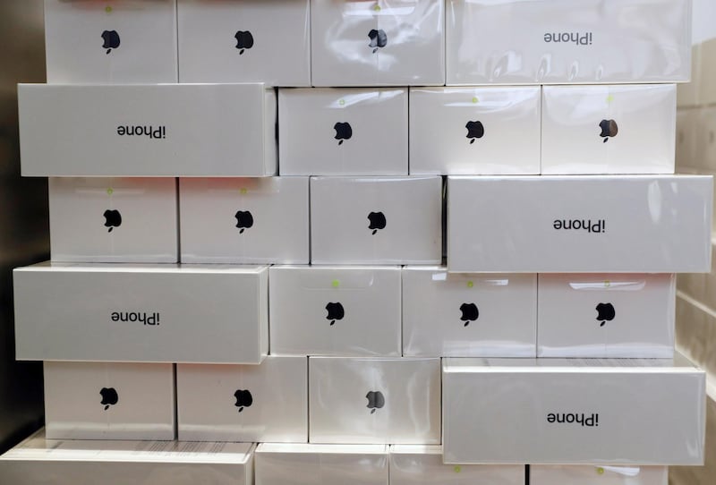FILE PHOTO: Boxes of iPhone X are pictured during its launch at the Apple store in Singapore, November 3, 2017. REUTERS/Edgar Su/File Photo