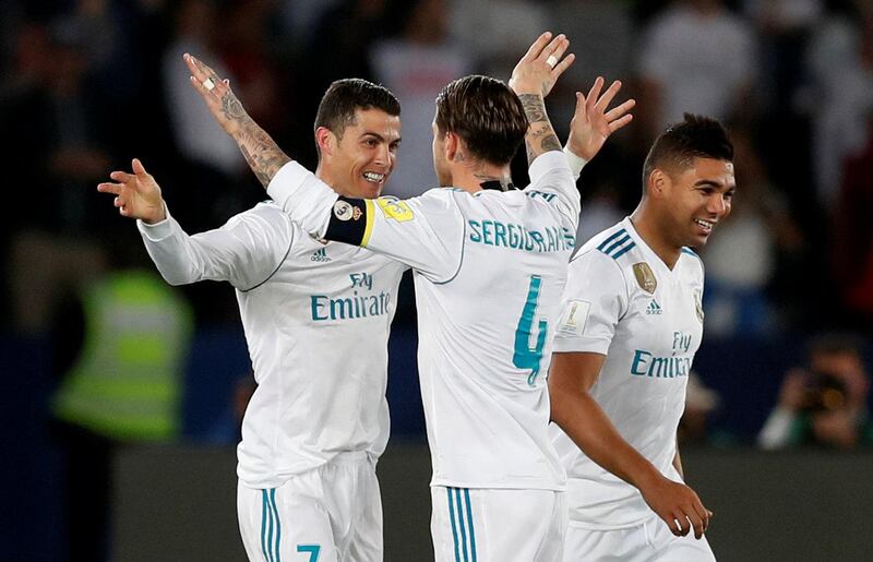 Soccer Football - FIFA Club World Cup Final - Real Madrid vs Gremio FBPA - Zayed Sports City Stadium, Abu Dhabi, United Arab Emirates - December 16, 2017   Real Madrid’s Cristiano Ronaldo celebrates with Sergio Ramos after scoring their first goal    REUTERS/Matthew Childs
