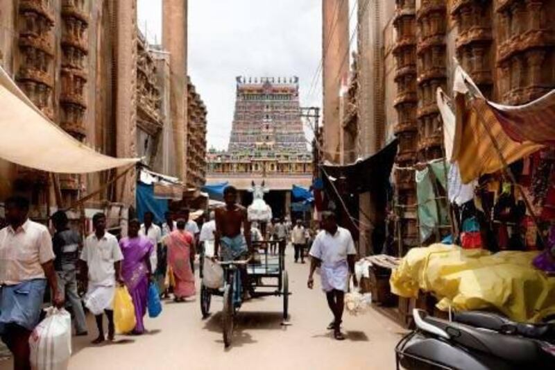 The Meenakshi temple, centre, is a good starting point for a walk around Madurai. istockphoto.com