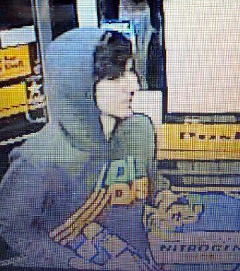 This surveillance photo released via Twitter Friday, April 19, 2013 by the Boston Police Department shows a suspect entering a convenience store that police are pursuing in Watertown, Mass.  Police say he is one of two suspects in the fatal shooting of an MIT police officer and tied to the Boston Marathon bombing. (AP Photo/Boston Police Department) *** Local Caption ***  Police Converge Mass.JPEG-0da44.jpg