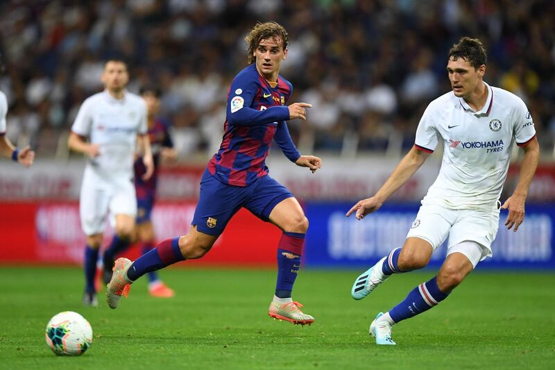 Barcelona forward Antoine Griezmann vies with Chelsea defender Andreas Christensen. AFP