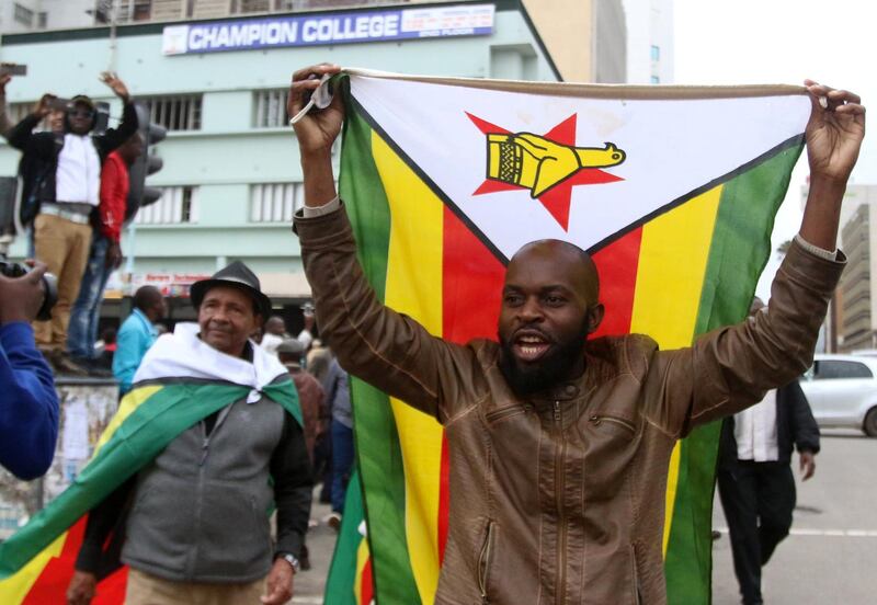 Protesters gather calling for Zimbabwean president Robert Mugabe to step down, in Harare. Philimon Bulawayo / Reuters