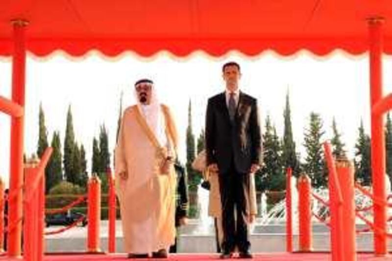 A handout picture from the Syrian Arab News Agency (SANA) shows Syrian President Bashar al-Assad and Saudi King Abdullah at al-Shaab palace  in Damascus  on October 07, 2009. Abdullah began a two-day visit to Syria, his first since acceding to the throne in 2005, in a further sign of warming ties between the two Arab states.  AFP PHOTO/HO-SANA