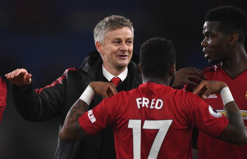 CARDIFF, WALES - DECEMBER 22:  Ole Gunnar Solskjaer, Interim Manager of Manchester United celebrates with Fred and Paul Pogba after the Premier League match between Cardiff City and Manchester United at Cardiff City Stadium on December 22, 2018 in Cardiff, United Kingdom.  (Photo by Stu Forster/Getty Images)