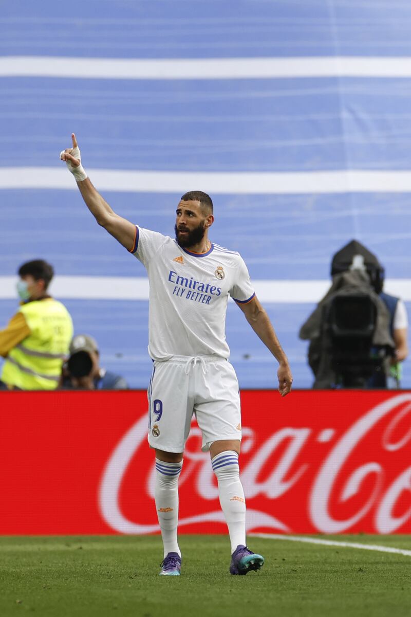 Striker Karim Benzema celebrates after scoring the fourth goal. EPA