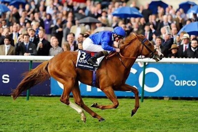 Kevin Manning rides Dawn Approach to win the 2,000 Guineas at Newmarket.