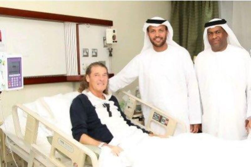 A file picture Pictures from provided of the Al Wasl board members paying a visit to Bruno Metsu.