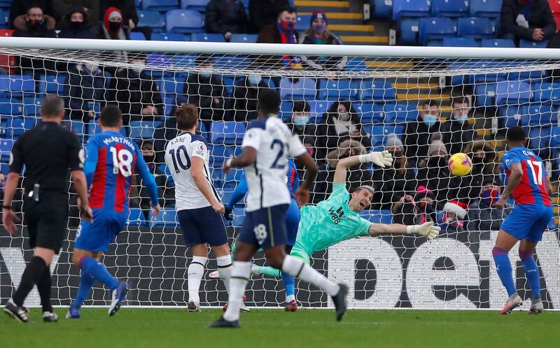 Palace goalkeeper Vicente Guaita saves from Spurs striker Harry Kane (No 10).