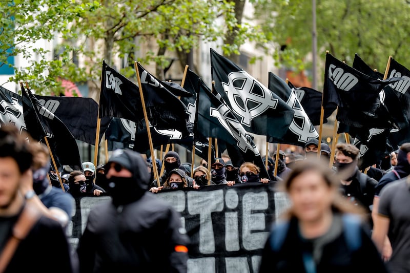Far-right protesters attend a rally organised by the extreme right-wing organisation C9M in Paris on May 6. EPA