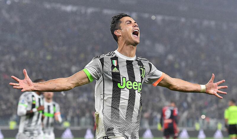 epa07961192 Juventus' Cristiano Ronaldo celebrates after scoring during the Italian Serie A soccer match between Juventus FC and Genoa CFC at Allianz stadium in Turin, Italy, 30 October 2019.  EPA/ALESSANDRO DI MARCO