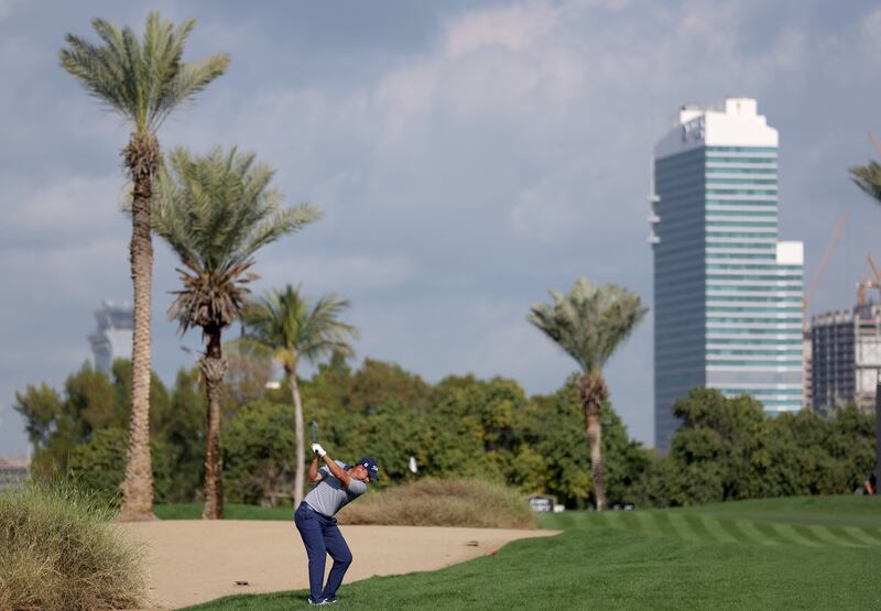 Richard Bland plays his second shot on the 12th hole. Getty