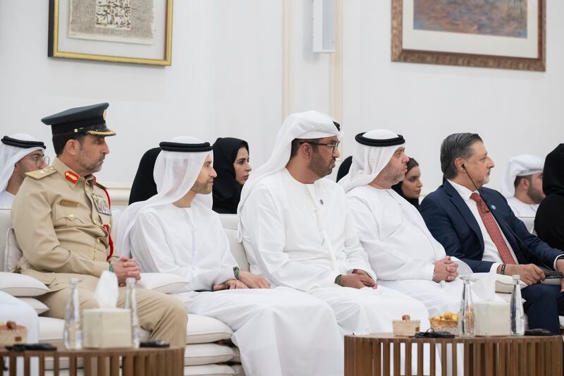 Dr Sultan Al Jaber, Minister of Industry and Advanced Technology and President-designate of Cop28, third right, and Mohamed Al Hussaini, Minister of State for Financial Affairs, fourth right, attend the meeting