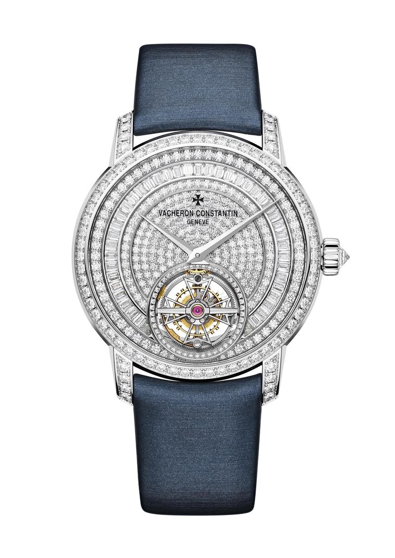 Traditionnelle Tourbillon Jewellery: Vacheron Constantin has also launched its first self-winding tourbillon for ladies, the Traditionnelle Tourbillon. It has all the trademarks of the time-tested Traditionelle collection: a round stepped case, a discreet bezel, a fluted case-back and dauphine-shaped hands, now housed within a new 39 mm diamond- set pink gold case, or in the diamond-paved white gold jewellery version pictured here, which is decked in 559 brilliant-cut and baguette-cut gems. An in-house 2160 calibre features a peripheral rotor and a three-day power reserve.