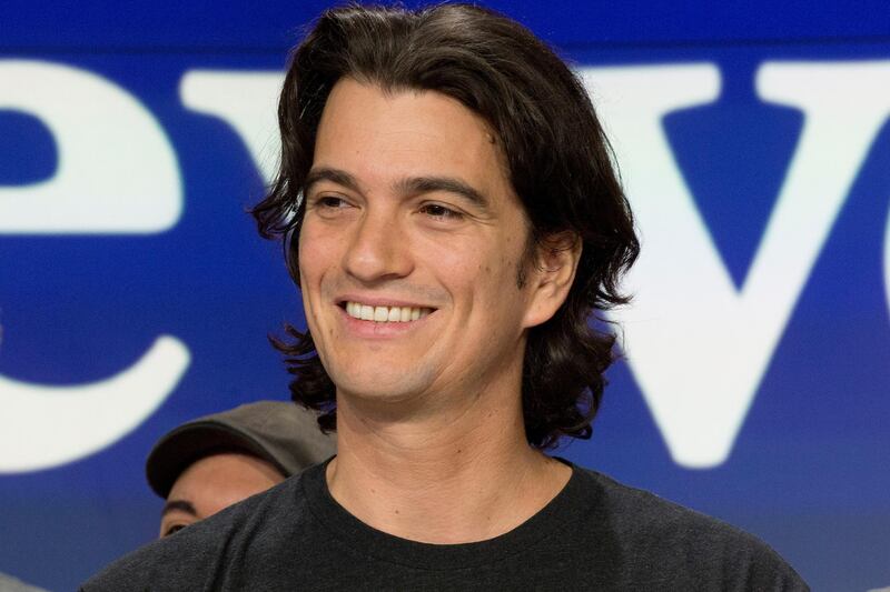 FILE - In this Jan. 16, 2018 file photo, Adam Neumann, co-founder and CEO of WeWork, attends the opening bell ceremony at Nasdaq, in New York. WeWork is delaying its IPO, saying it now expects the offering to be completed by the end of the year. The office-sharing company is hoping to restore investor confidence amid doubts about its ability to make money and decisions thatâ€™ve raised concerns about its CEO.  (AP Photo/Mark Lennihan, File)