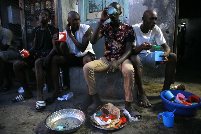 Muslims break their fast in a street in Abidjan in Ivory Coast. EPA