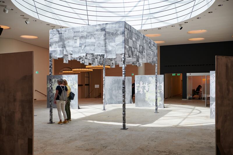 Eight large abstract paintings by German artist Melike Kar fill the atrium of UBS's Aeschenvorstadt branch. Photo: Art Basel