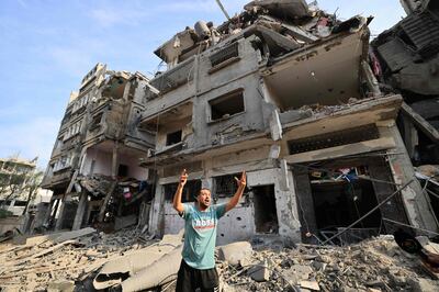 A Palestinian man among the destruction after an Israeli bombardment in al-Karama district in Gaza City on Wednesday. AFP 