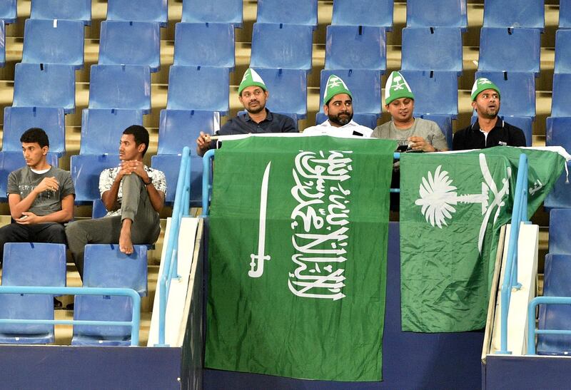 Saudi fans cheer during a friendly football match between Saudi Arabia and Iraq. AFP