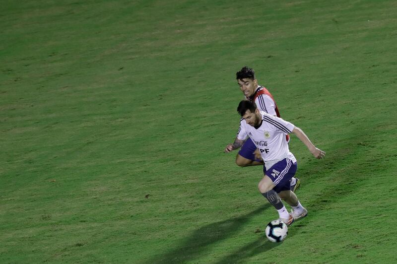 Messi controls the ball as he trains with his teammates ahead of the Copa America. AP Photo