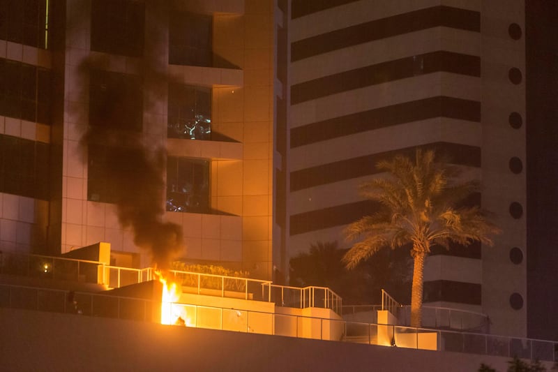 DUBAI. UNITED ARAB EMIRATES, 04 AUGUST 2017. A massive fire rips through The Marina Torch tower's southern corner. A fire on the plaza level of the building started by falling debris. (Photo: Antonie Robertson) Journalist: None. Section: National.