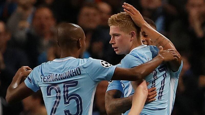 Kevin De Bruyne, right, scored a stunning goal to open the scoring for Manchester City against Shakhtar Donetsk. Lee Smith / Reuters