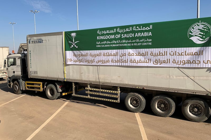 A truck carrying aid donated by Saudi Arabia makes its way into Iraq after the opening of Saudi-Iraqi border in Arar. Reuters
