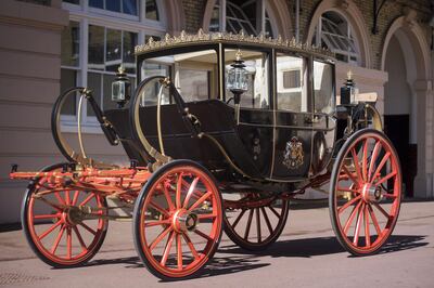 LONDON, ENGLAND - MAY 1: The Scottish State Coach, which will be used in the case of wet weather at the wedding of Prince Harry and Meghan Markle, at the Royal Mews at Buckingham Palace on May 1, 2018 in London, England. (Photo by Victoria Jones - WPA Pool/Getty Images)