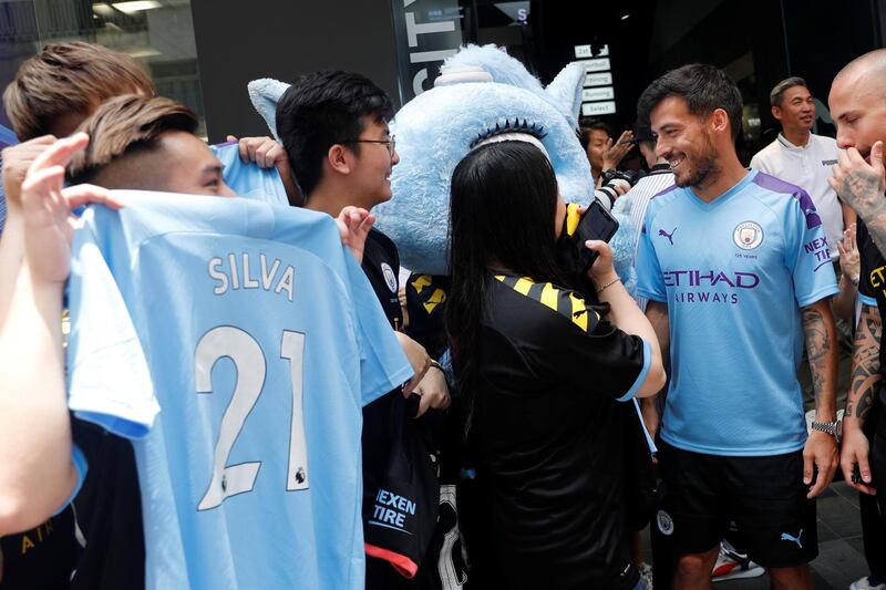 David Silva talks to fans during a promotional event for Manchester City in Hong Kong. Reuters