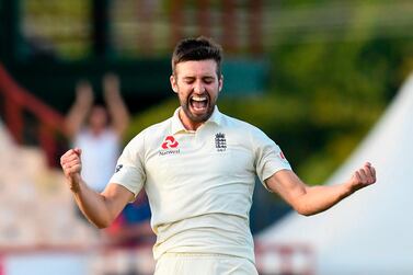 England fast bowler Mark Wood celebrates taking the first five-wicket haul of his Test career. Randy Brooks / AFP