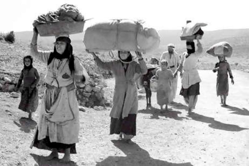 epa01333549 A handout picture provided by the Israeli Goverment Press Office on 04 May 2008 shows Arabs fleeing with just tthe possessions they are able to carry as they make their way toward Lebanon from villages in the Galilee during Israel's 1948 War of Independence. During the 1948 war Arabs fled to Lebanon, to Jordan, into the West Bank areas, and the Gaza Strip and became refugees in what they refer to as the 'Nakba,' or the catastrophy. Israel celebrates its 60th anniversary on May 14, according to the internationally-used Gregorian calendar; on May 8, according to the

Hebrew calendar.  EPA/ELDAN DAVID  EDITORIAL USE ONLY