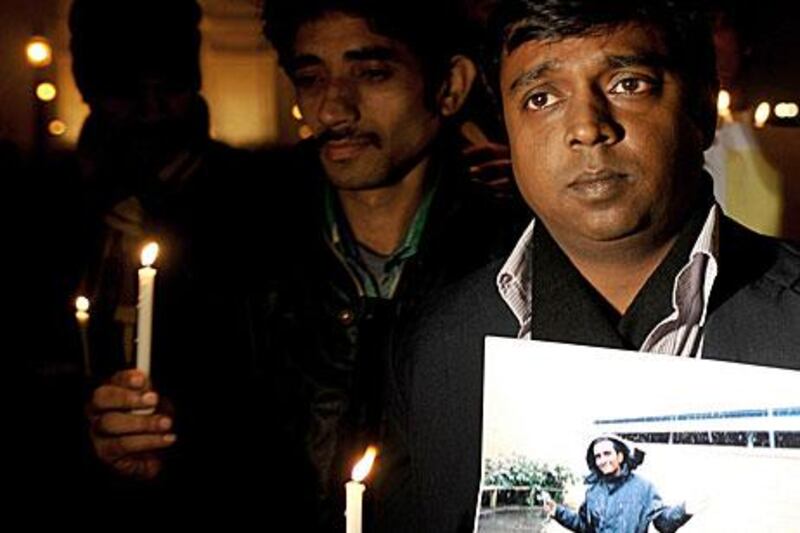 Friends of murdered Indian student Anuj Bidve stage a rally in New Delhi yesterday. A man describing himself as “Psycho Stapleton” has appeared in a British court accused of shooting Bidve, 23, in the head.